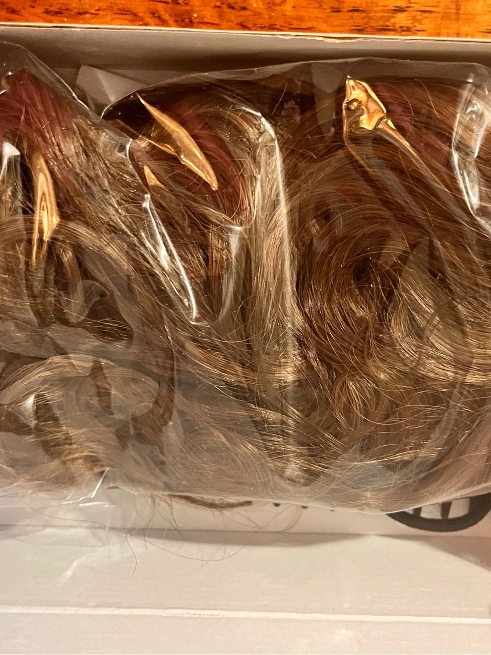 Hair Extensions (2) Honey Blonde Highlights and one that is Chocolate Brown